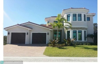Photo is from a previously built Cypress Model Home. New Cypress II has flat roof tile, more open floorplan.
