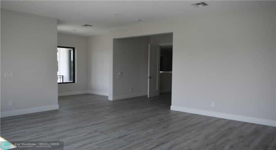 Photo from previously built Deerwood Model Home.  Master Bedroom with  Sitting Area and Balcony