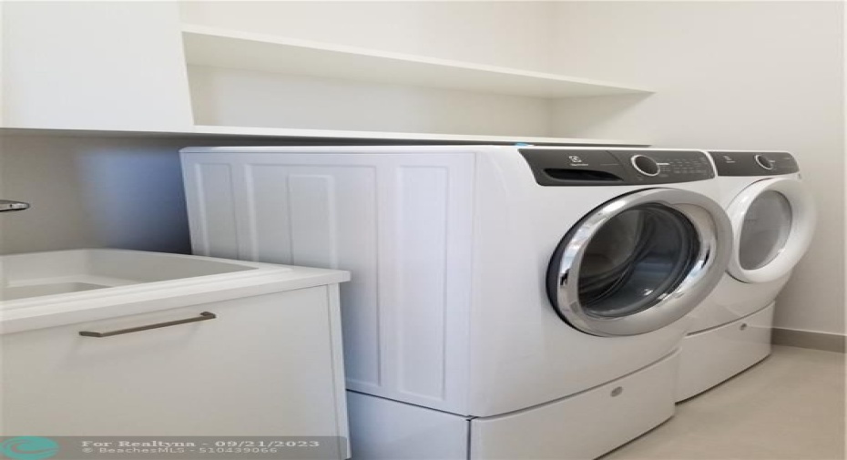 Photo from previously built Deerwood Model Home.  Laundry Room located upstairs
