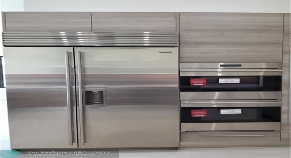 Photo from previously built Deerwood Model Home. Subzero and Wolf appliances