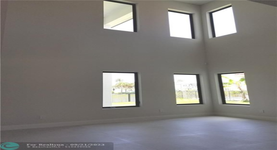 Photo from previously built Deerwood Model Home.   Double height Great Room.