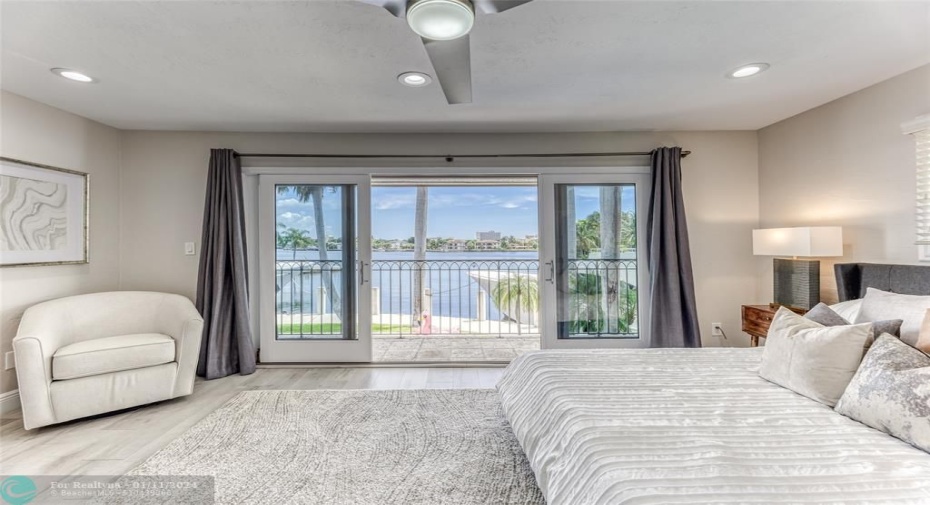BEDROOM #2 (Upstairs) KING Size with balcony overlooking waterway with en suite bathroom, shower, smart TV