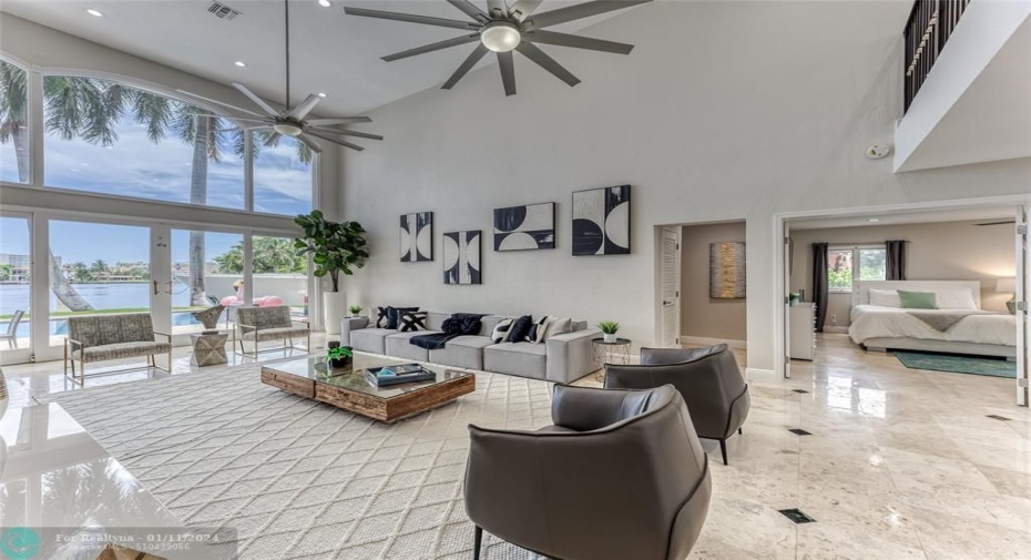Open Layout Family Area overlooking Waterway & Pool Area