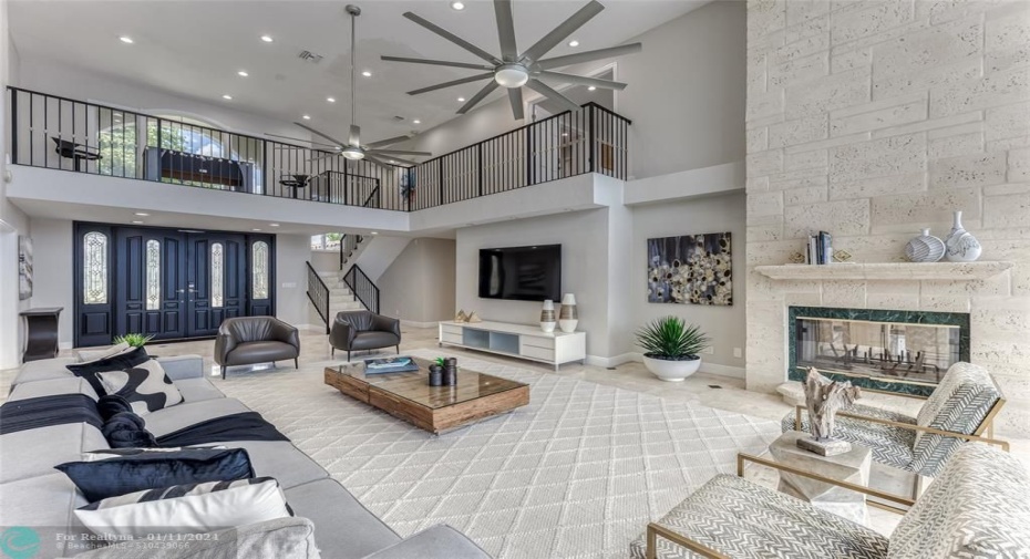 Open Layout Family Area overlooking Waterway & Pool Area