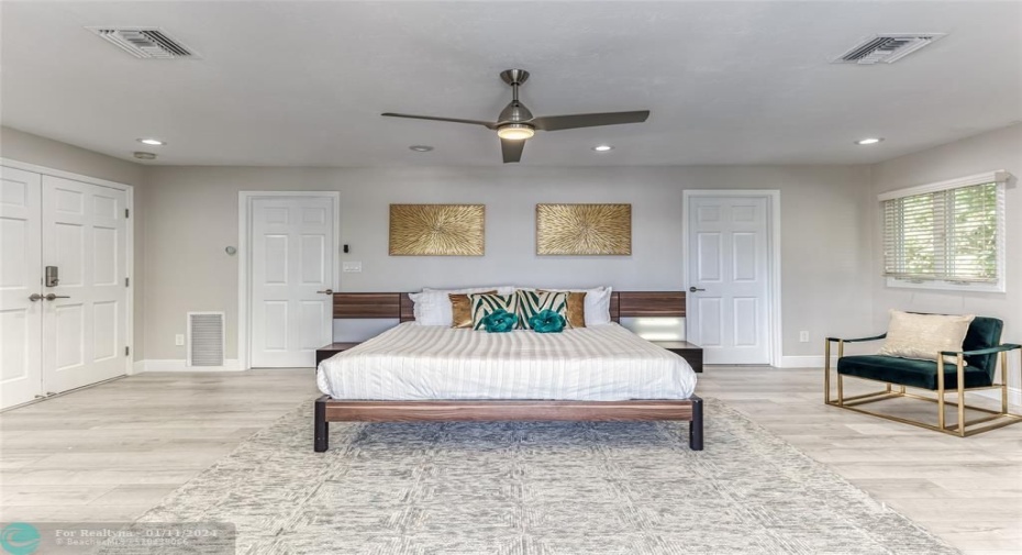 BEDROOM #1 (Upstairs) KING Size with Balcony overlooking waterway, En Suite bathroom w jacuzzi tub & seperate shower, Walk in closet, Smart TV
