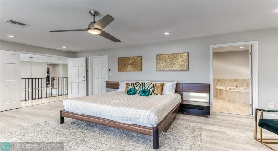 BEDROOM #1 (Upstairs) KING Size with Balcony overlooking waterway, En Suite bathroom w jacuzzi tub & seperate shower, Walk in closet, Smart TV