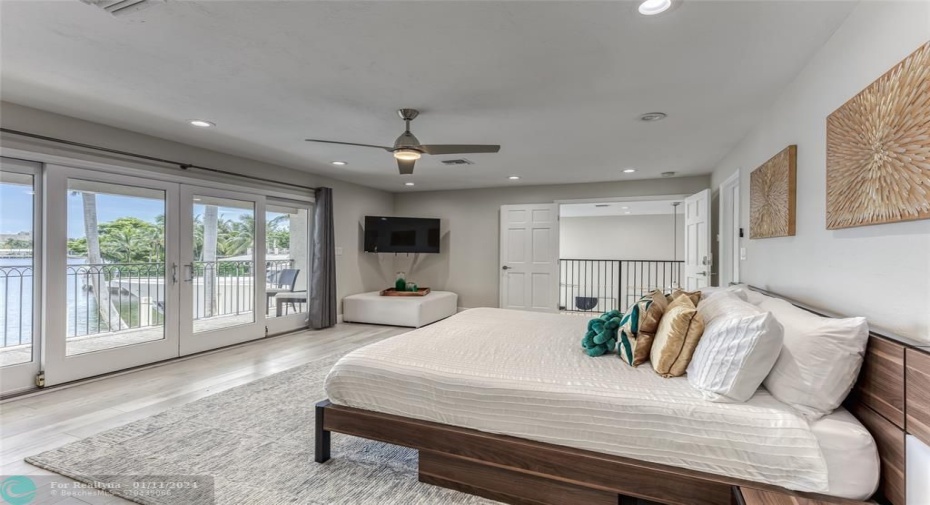 BEDROOM #1 (Upstairs) KING Size with Balcony overlooking waterway, En Suite bathroom w jacuzzi tub & seperate shower, Walk in closet, Smart TV