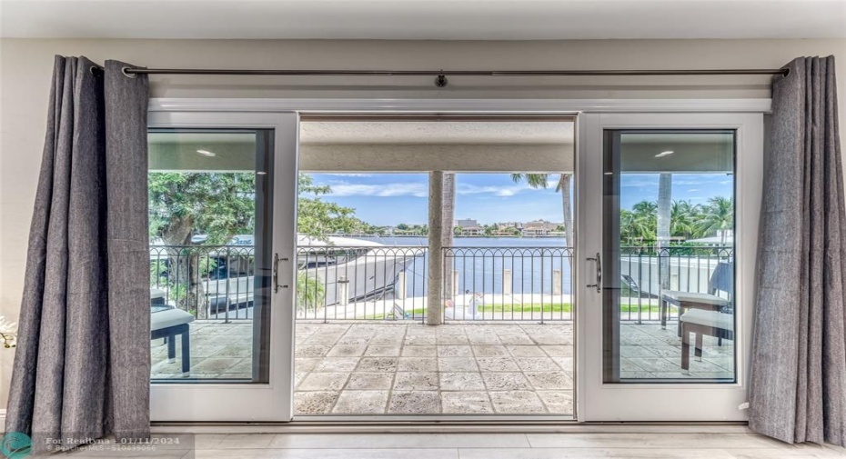 BEDROOM #1 (Upstairs) KING Size with Balcony overlooking waterway, En Suite bathroom w jacuzzi tub & seperate shower, Walk in closet, Smart TV