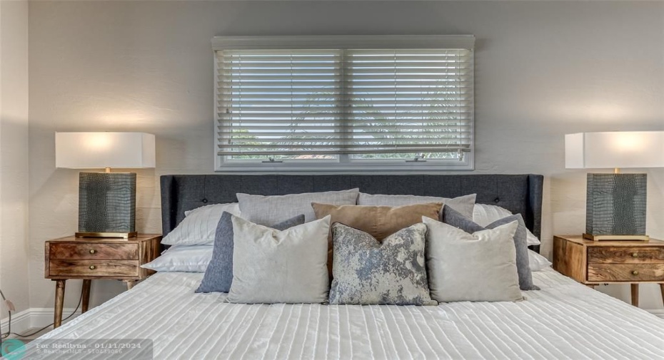 BEDROOM #2 (Upstairs) KING Size with balcony overlooking waterway with en suite bathroom, shower, smart TV