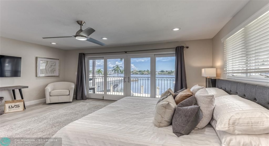 BEDROOM #2 (Upstairs) KING Size with balcony overlooking waterway with en suite bathroom, shower, smart TV