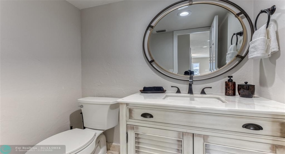 Half Bathroom located Downstairs