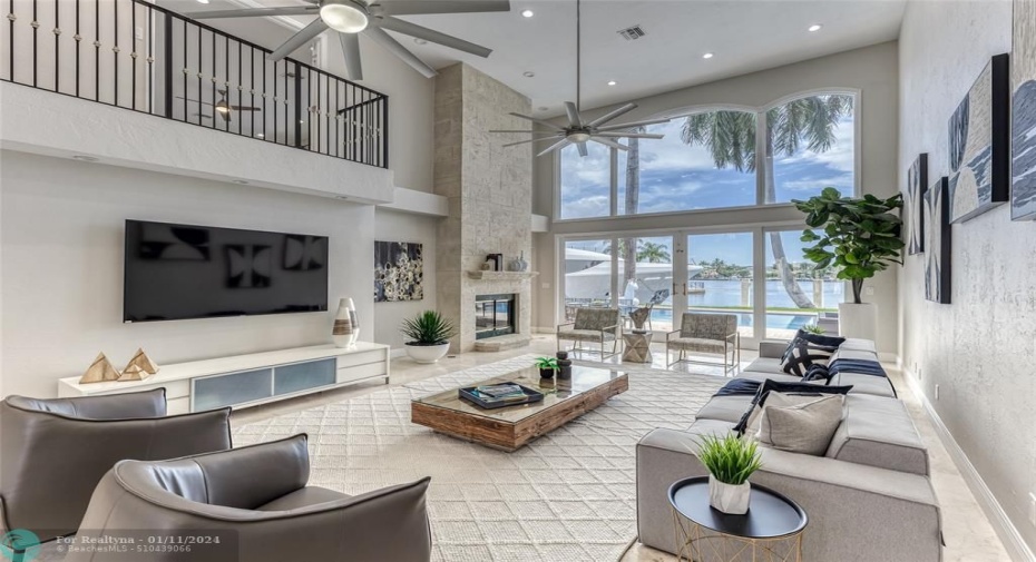Open Layout Family Area overlooking Waterway & Pool Area