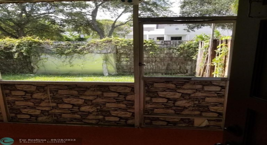 Screened back patio