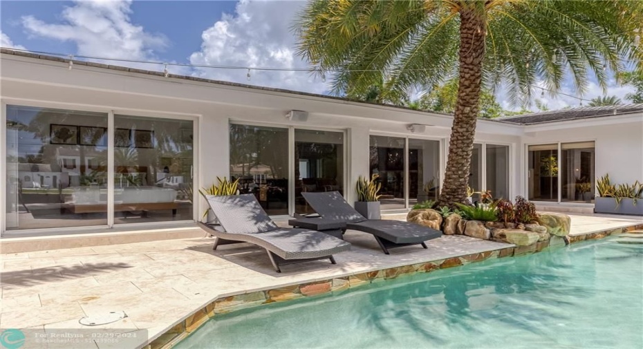 Large windows for pool views from inside the home