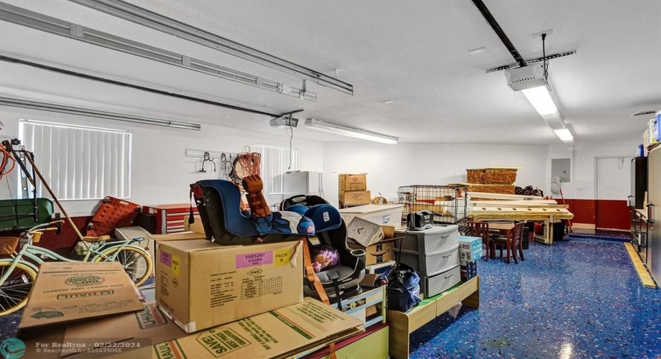 2 Car Garage with additional storage space in the back end.