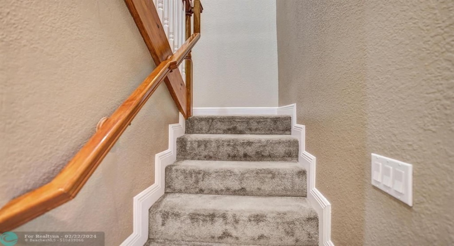 Stairs lead to the Primary bedroom that spans the 2nd floor.