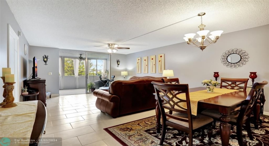 SPACIOUS LIVING ROOM ALL TILE FLOORING (DINING AREA LIGHT FIXTURE NOT INCLUDED)