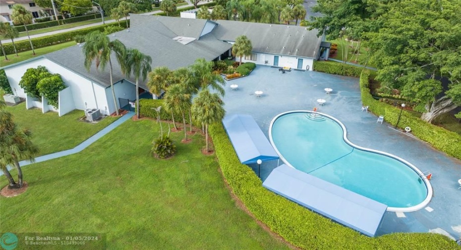CLUB HOUSE WITH LARGE BALLROOM AND FULL KITCHEN. CLUBHOUSE HAS GYM, 2 SAUNAS, BILLIARDS ROOM, AND LIBRARY,