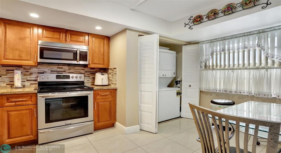 LARGE WASHER DRYER IN KITCHEN