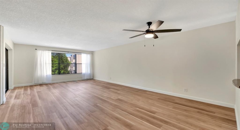WOW!!! NO POPCORN CEILINGS, NEW LUXURY VINYL FLOORING w/SOUND BARRIER PADDING, NEW 4.5
