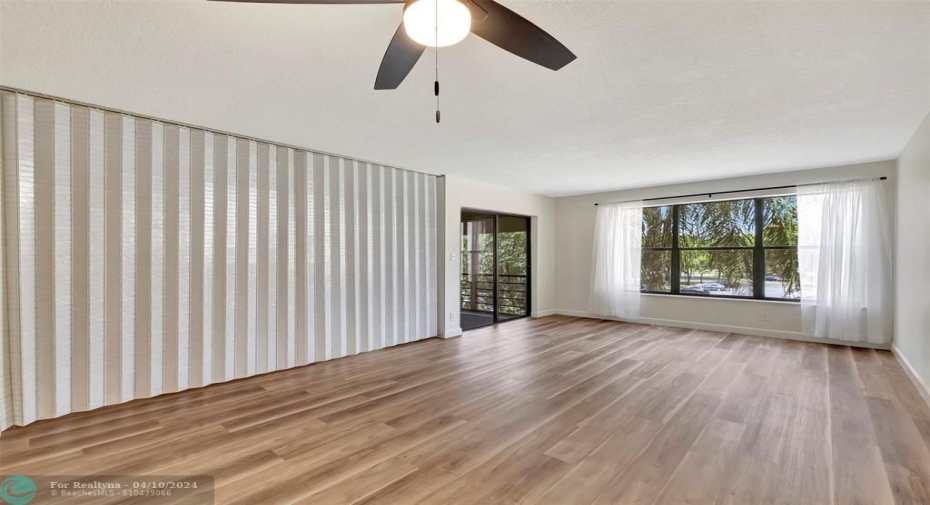 On the Left is the 2nd Bedroom/Den (Convertible) with BLINDS CLOSED to the Bedroom/Den if you want. In the 2nd Bedroom/Den there is also a SECRET HIDDEN DESK Disguised as a DISPLAY CABINET as well as a BUILT-IN MURPHY BED (Check them out in other photos)