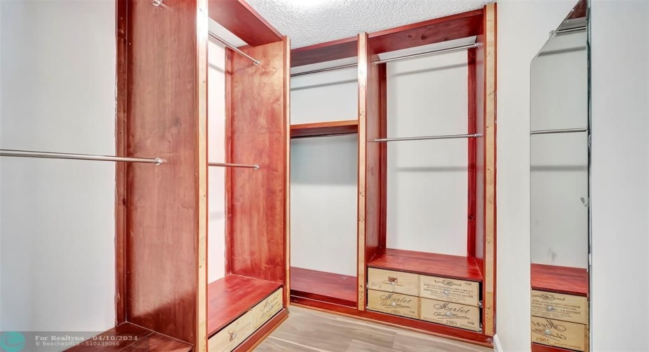 Your Future Primary Bedroom, WALK-IN CLOSET comes complete with CUSTOM CLOSET CABINETRY (MAHOGANY WOOD PANELING), DRAWERS AND WALL MIRROR. Your closet will be all the envy of your friends and neighbors.