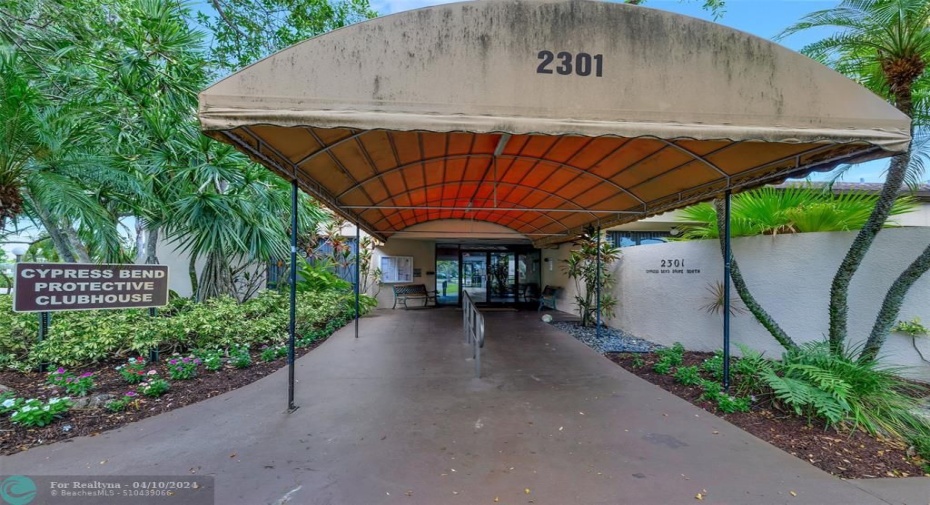 Entrance to the Community Clubhouse! Clubhouse & 2nd Pool. Amenities Include - Sauna, HUGE Gym, Game Room (Billiards, Ping Pong, Foosball, Darts & MORE!), 2 Pools, Clubhouse with Kitchen & Meetings Rooms, HUGE Library, HUGE Laundry, Tennis, Pickle-ball & Racquetball/Handball Courts, Playground, Car-wash Area, Bicycle Storage & MORE!