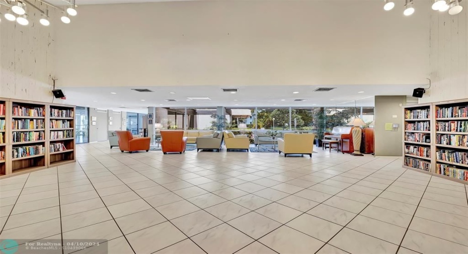 Fabulous Poolside Lounge complete with Piano and Wait Until You See The Size Of The Community LIBRARY!