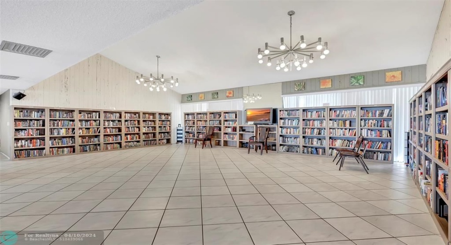 HUGE Community Library! Books, Books & More Books. Grab one, read it in the Lounge, Poolside or enjoy it in YOUR FUTURE CONDO just on the other end of the HUGE PARKING LOT with LOTS of GUEST PARKING! Bring it back & Take Another to Enjoy! This is a Readers Dream!
