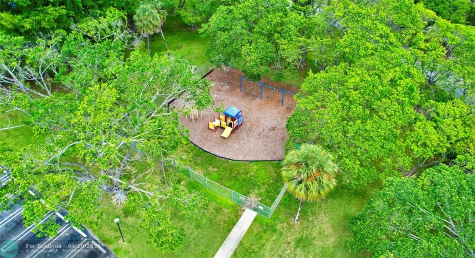 Right across the street from your building and the Clubhouse you will find the Playground and So Much More!