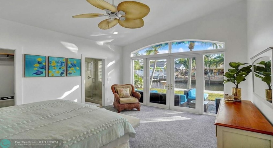 Step outside, and be immersed in sunshine & lush, tropical landscaping