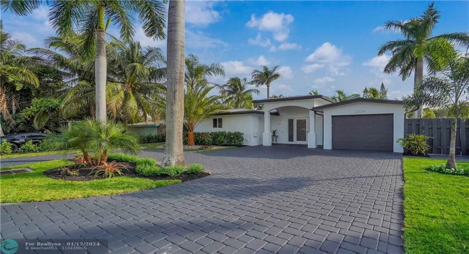 Attached garage plus plenty of parking in circular driveway
