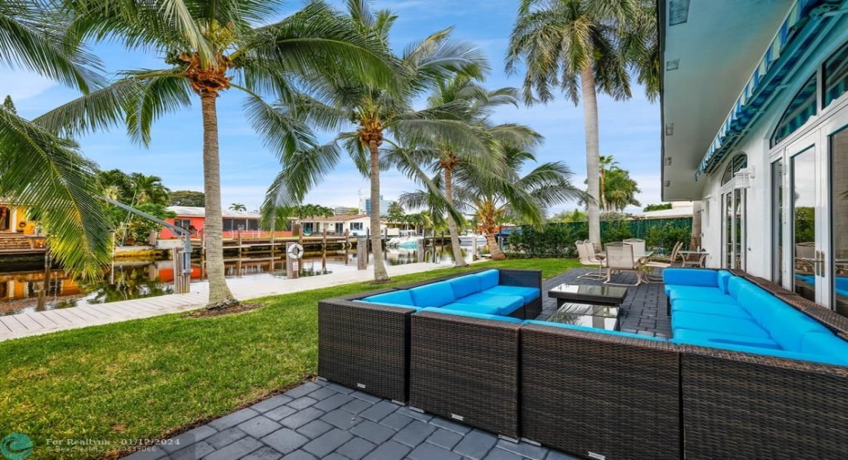 Step outside and be immersed in sunshine & tropical palms