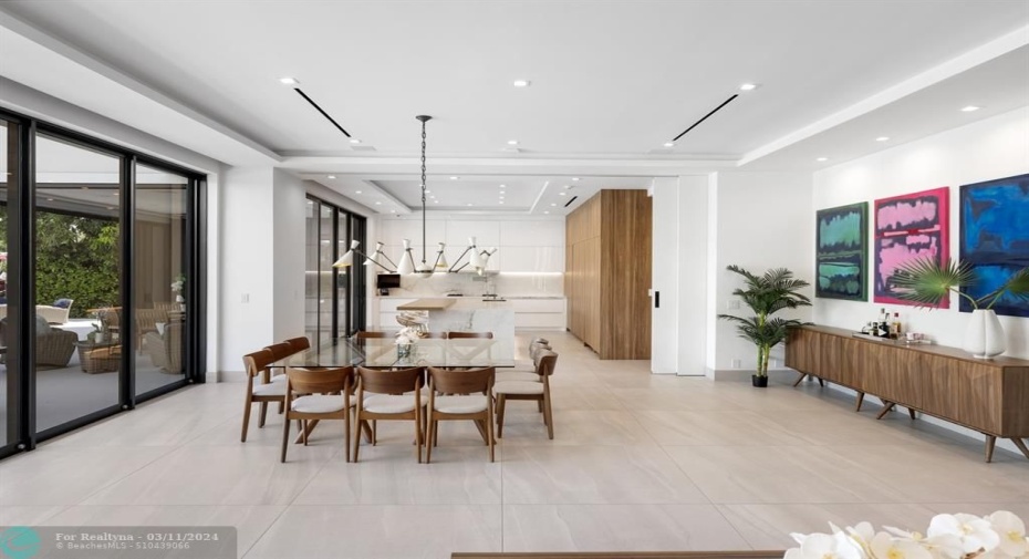 A Concealed Door Sperates the Kitchen & Dining Room When Entertaining