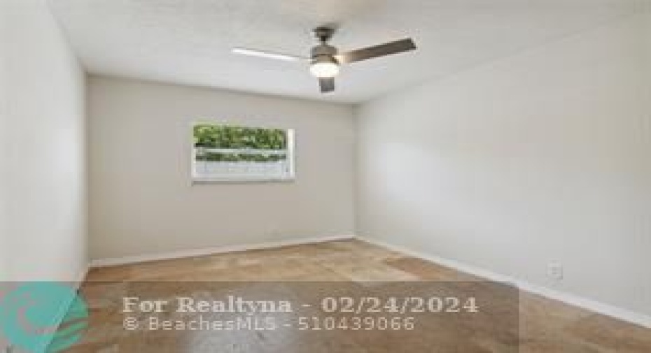 First bedroom all marble floors impact window