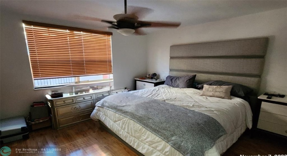 photo provided to display scale of primary bedroom. Property available only unfurnished.