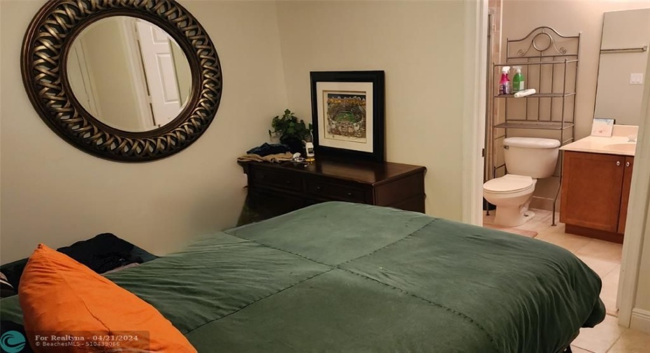 photo provided to display scale of ground level bedroom. Property available only unfurnished.