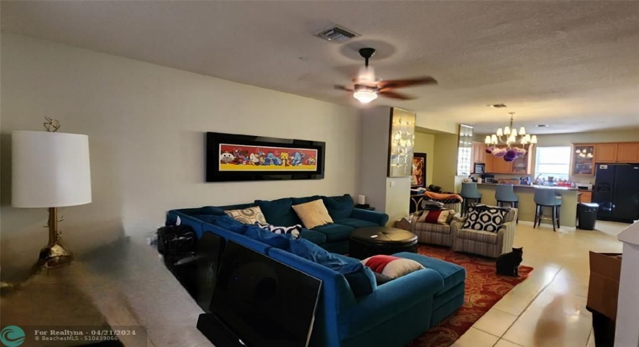 photo provided to display scale of living room. Property available only unfurnished.