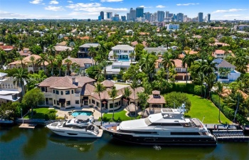 Beautiful sprawling resort style home in the Las Olas Isles now available for lease!  This 7 Bedroom home sits on 3/4 of an acre.  Home includes amazing outdoor spaces, such as koi ponds with waterfall feature, tiki huts, gazebo with summer kitchen, large yard/green space, heated pool with hot tub plus so much more!