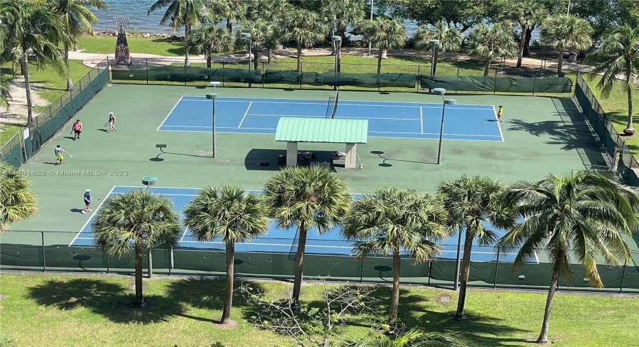 Tennis court in the park.