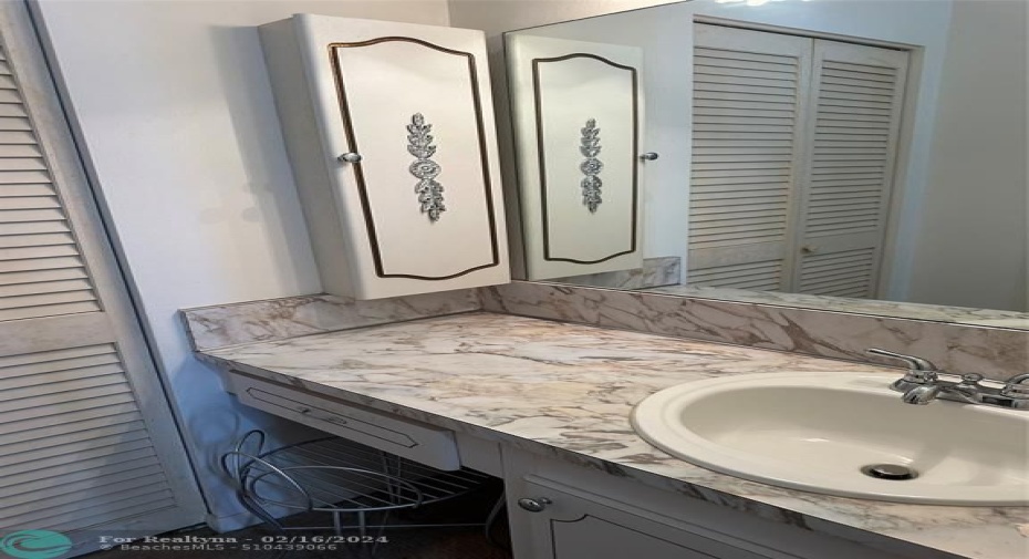 separate dressing room in master with 2 large closets
