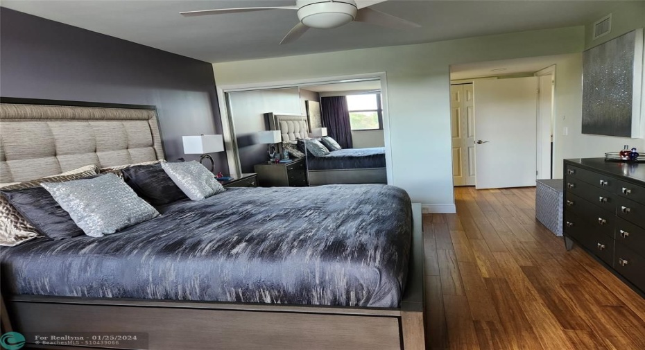 Primary bedroom with access to the balcony