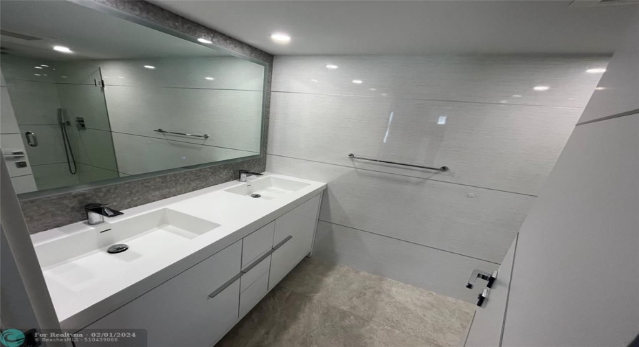 The hall bathroom includes double sinks.