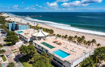 AERIAL VIEW OF BEACH CLUB ,TWO POOLS AND POOL DECKS