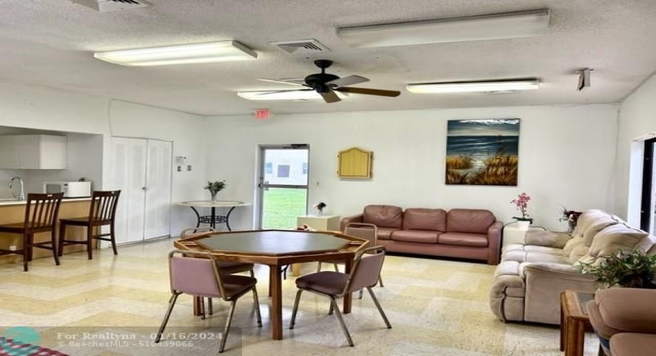 card room next to building and smaller pool