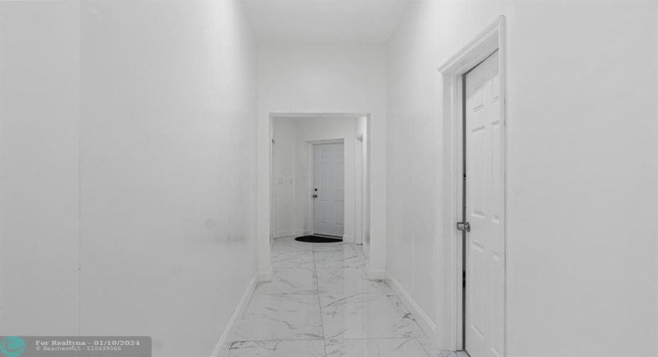 Hallway to Garage and Laundry Room