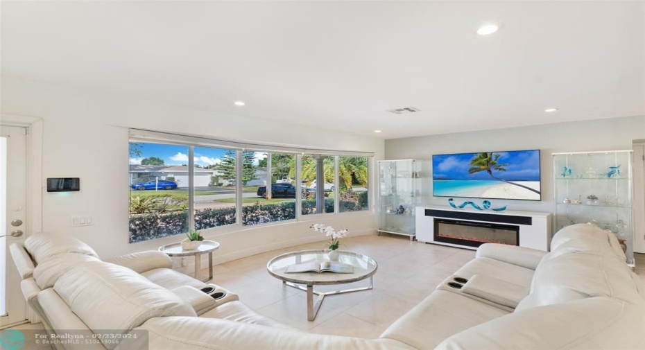 Large living room home all same large tiles throughout