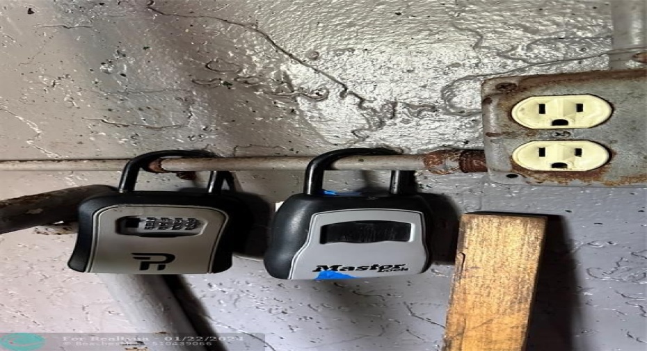 lockbox in utility room next to elevqtor