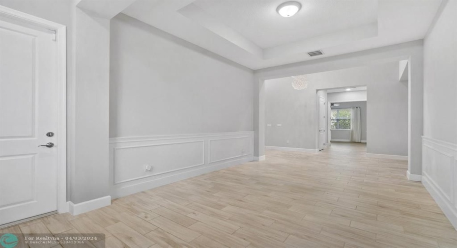 Formal Dining Room with Custom Cabinets and Granite Countertop