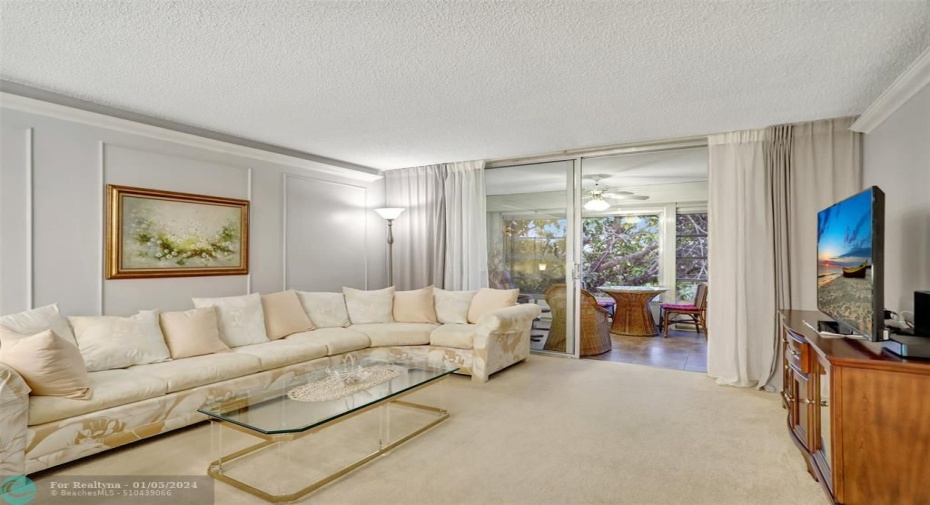 With view of balcony.
